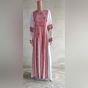 Made in Jordan one piece dress with embroidered red front